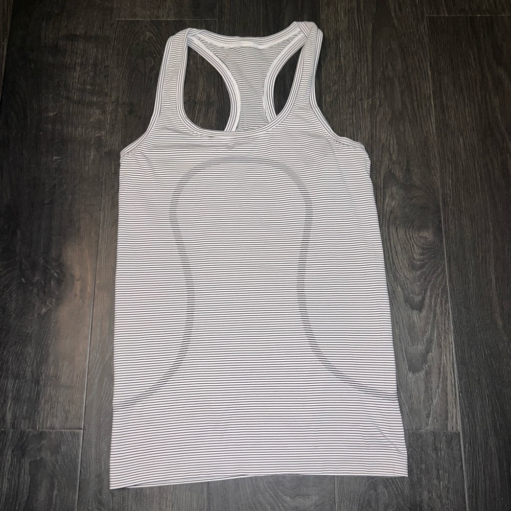 Lululemon black and white striped tank top. Size 4.